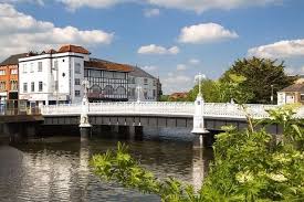 A white bridge spans the River Tone in Taunton